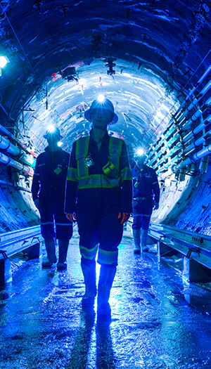 Cameco workers walking through mine
